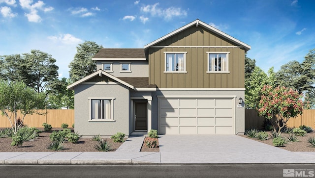 view of front of home with board and batten siding, fence, a garage, and driveway