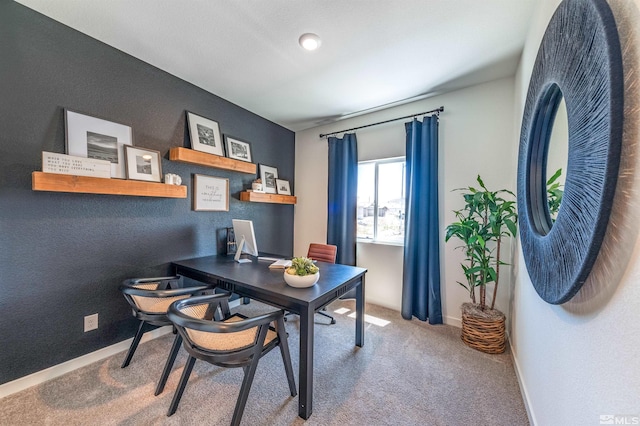 home office featuring baseboards and carpet floors