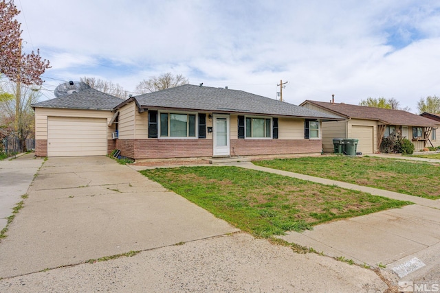 view of front of property featuring concrete driveway, a front yard, brick siding, and an attached garage