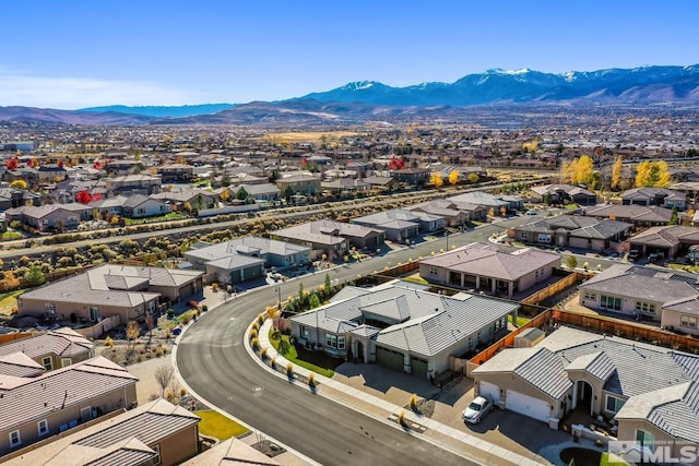 drone / aerial view with a mountain view and a residential view