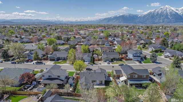 aerial view featuring a residential view and a mountain view