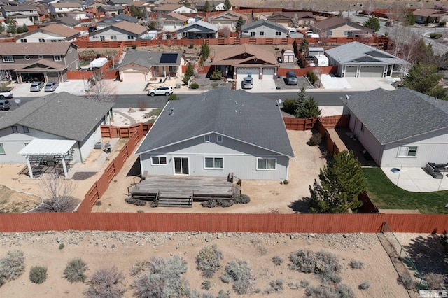 birds eye view of property with a residential view