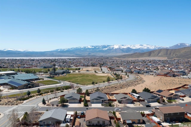 bird's eye view with a residential view and a mountain view