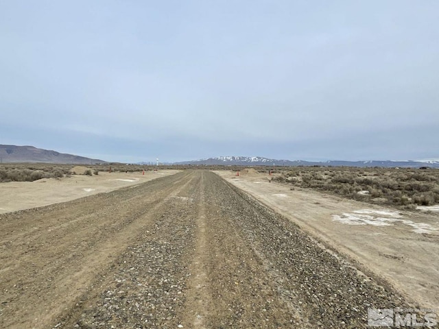 view of road featuring a rural view and a mountain view