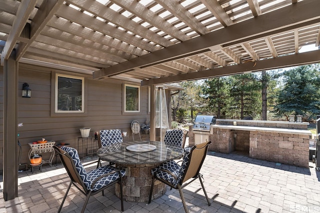 view of patio / terrace with outdoor dining area, a pergola, and area for grilling