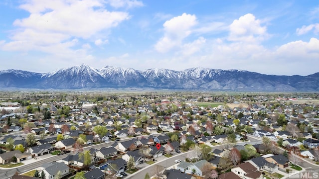 birds eye view of property featuring a residential view and a mountain view