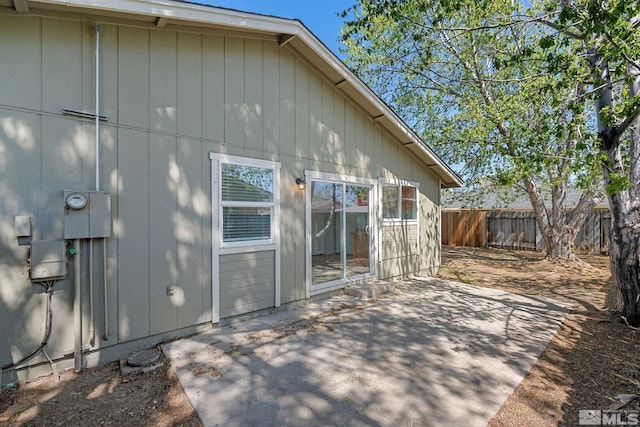 exterior space with fence and a patio area