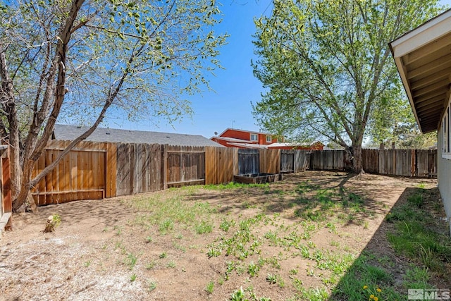view of yard featuring a fenced backyard
