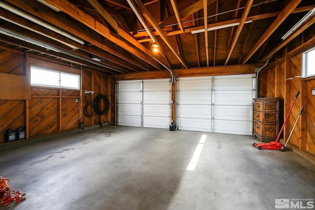 garage with wood walls