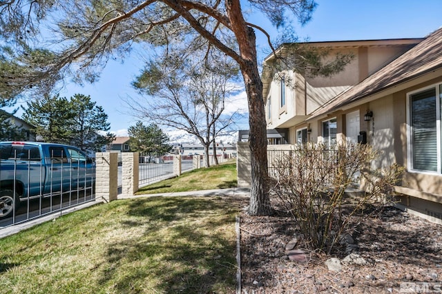 view of yard with fence