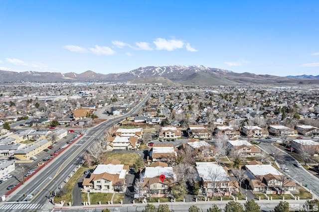 bird's eye view with a residential view and a mountain view