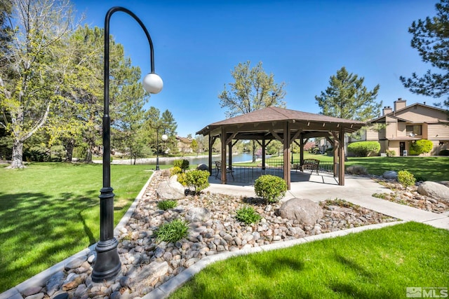 view of community with a gazebo and a yard