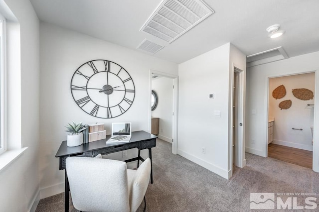 home office featuring attic access, carpet floors, visible vents, and baseboards