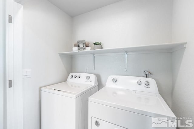 laundry area with washer and dryer and laundry area