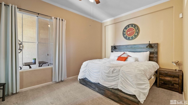 carpeted bedroom with ceiling fan, crown molding, baseboards, and multiple windows