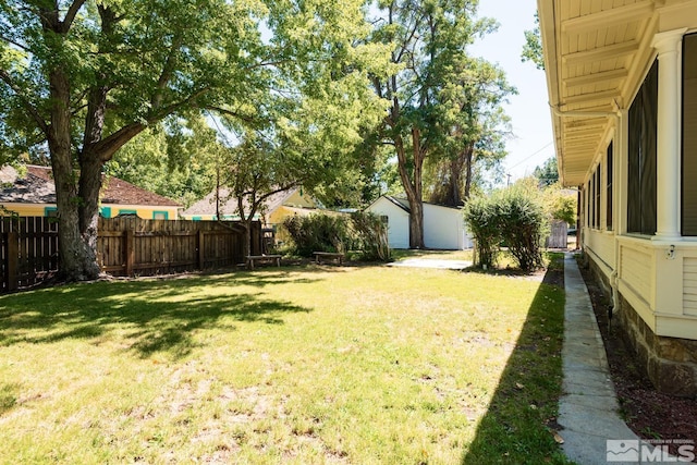 view of yard with fence