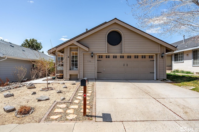 ranch-style home featuring concrete driveway