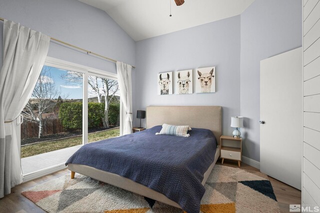 bedroom with vaulted ceiling, ceiling fan, and wood finished floors