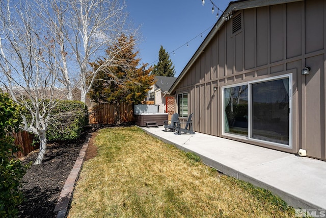 view of yard with a patio and fence