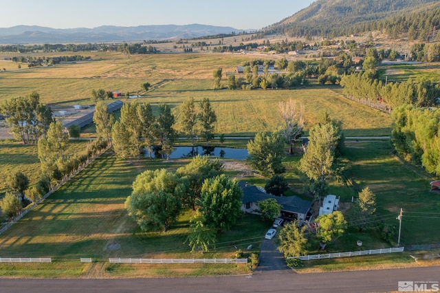 bird's eye view with a rural view and a water and mountain view