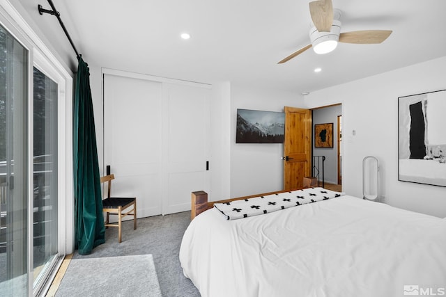 bedroom with carpet, ceiling fan, recessed lighting, and a closet
