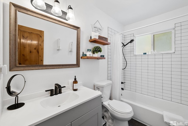 bathroom with shower / tub combo, toilet, and vanity