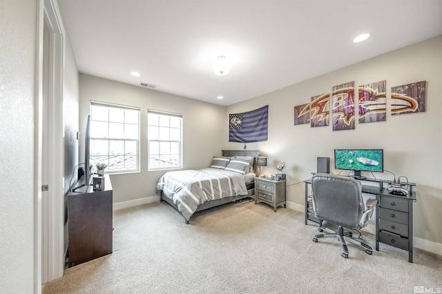 bedroom with visible vents, carpet flooring, and baseboards