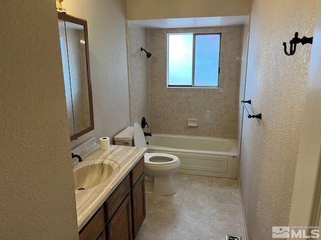full bathroom featuring vanity, bathing tub / shower combination, tile patterned floors, toilet, and a textured wall