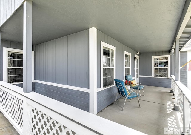 exterior space featuring covered porch