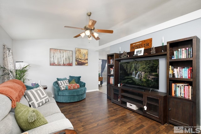 living room featuring baseboards, wood finished floors, ceiling fan, and lofted ceiling