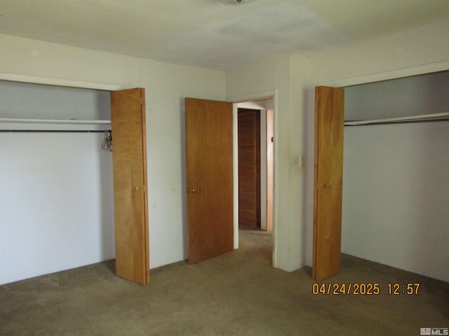 unfurnished bedroom with carpet flooring