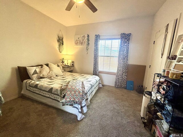 carpeted bedroom featuring a ceiling fan