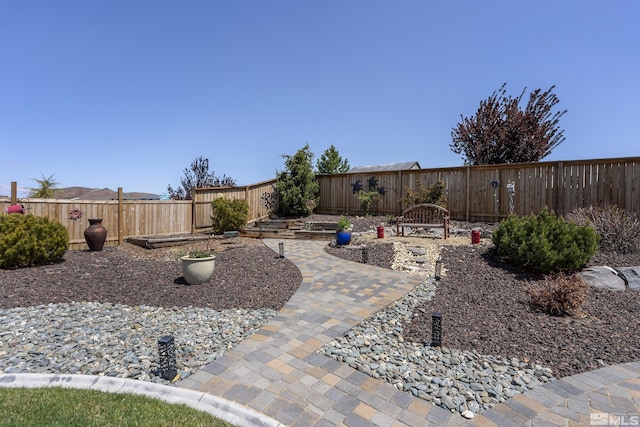 view of yard with a fenced backyard