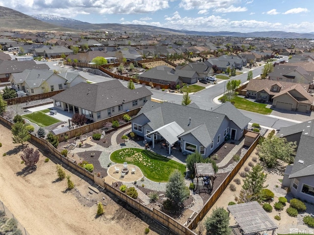 aerial view featuring a residential view and a mountain view