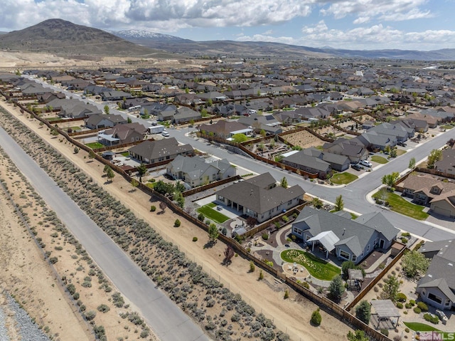 birds eye view of property featuring a residential view and a mountain view
