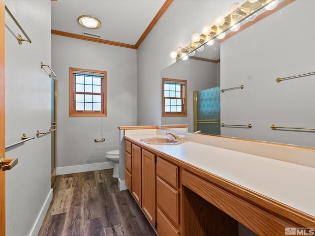 full bath with toilet, baseboards, wood finished floors, visible vents, and ornamental molding