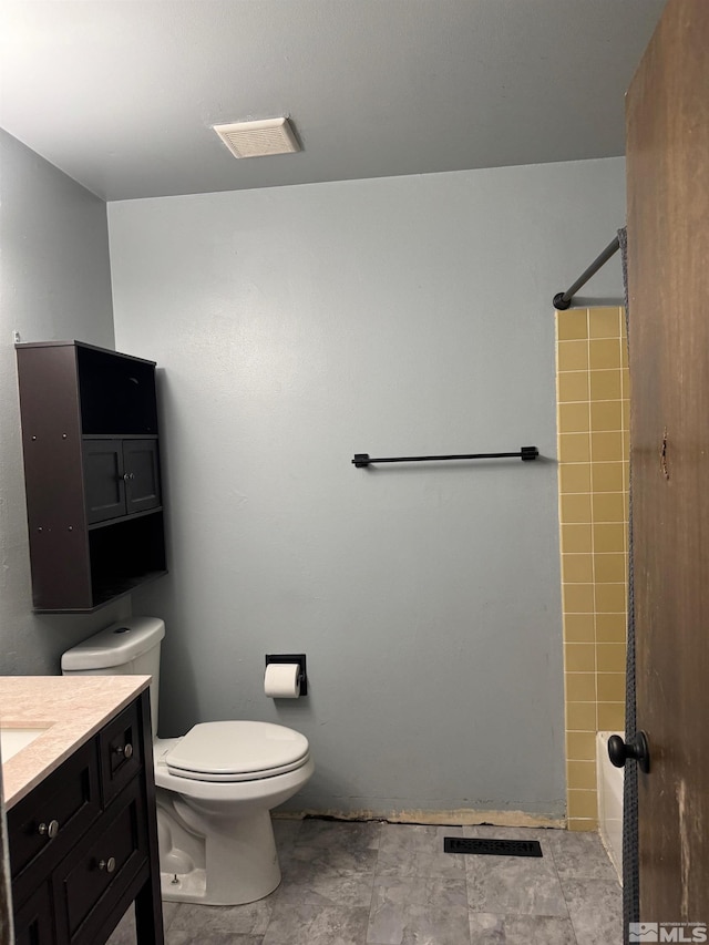 full bathroom featuring vanity, shower / tub combination, and toilet