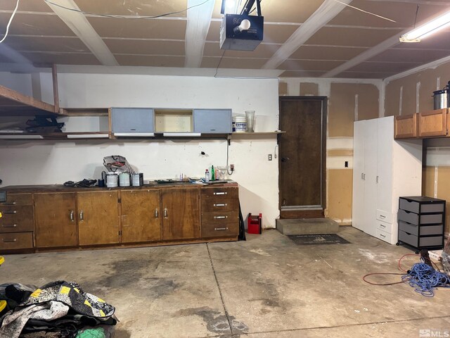 garage featuring a garage door opener