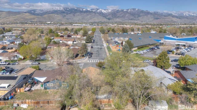 aerial view featuring a mountain view and a residential view