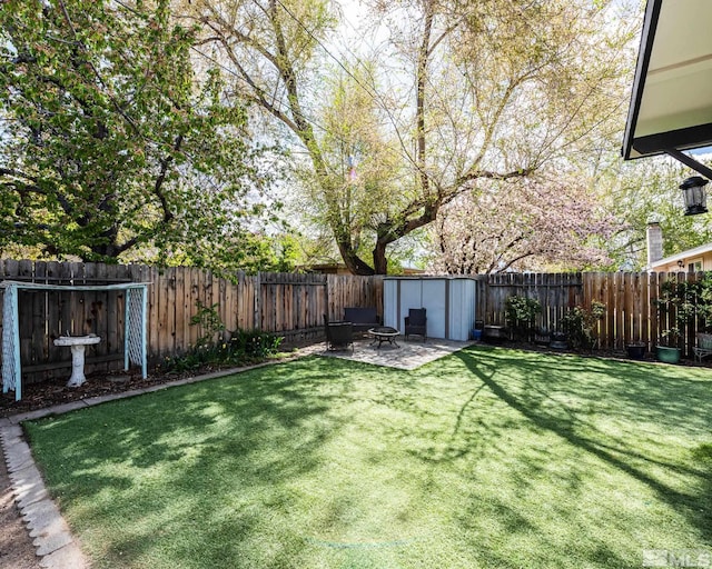 view of yard featuring a fenced backyard and a patio