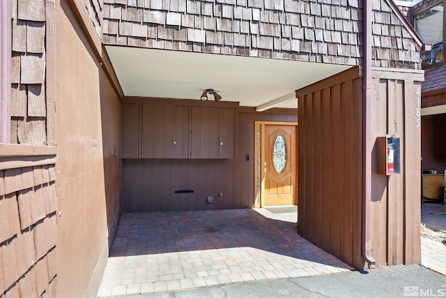 doorway to property with board and batten siding