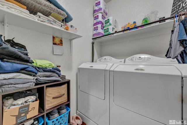 laundry area featuring laundry area and washer and dryer