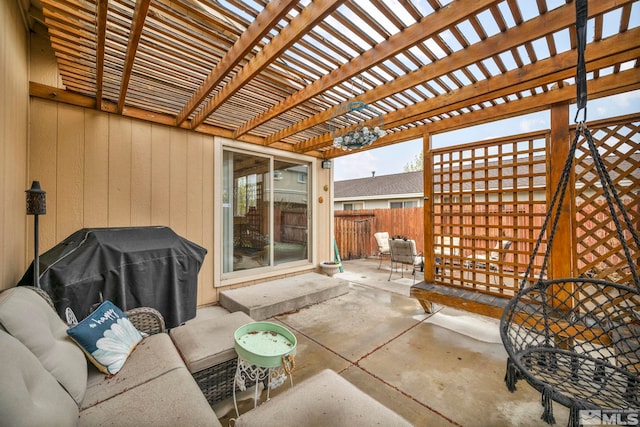 view of patio / terrace featuring outdoor lounge area, fence, a pergola, and a grill