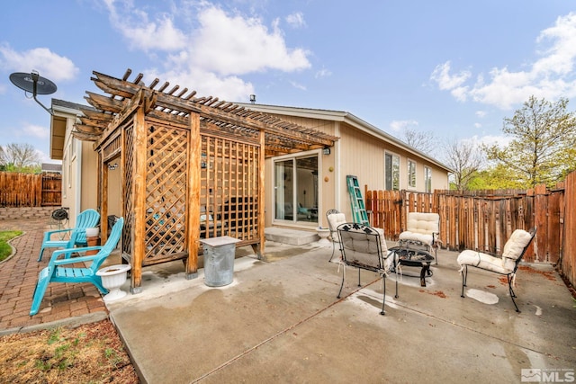 view of patio with a fenced backyard and a pergola