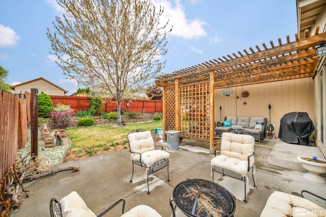 view of patio / terrace featuring a pergola, a grill, a fenced backyard, and an outdoor living space with a fire pit