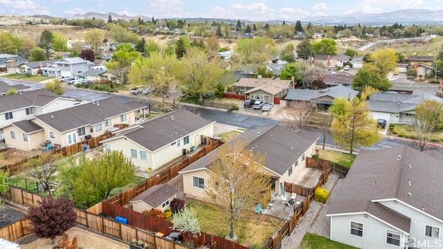 birds eye view of property featuring a residential view and a mountain view