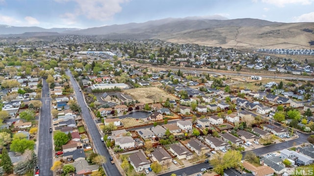 bird's eye view featuring a residential view and a mountain view