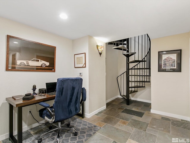 office with baseboards, recessed lighting, and stone tile flooring