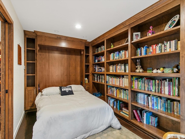 bedroom featuring baseboards