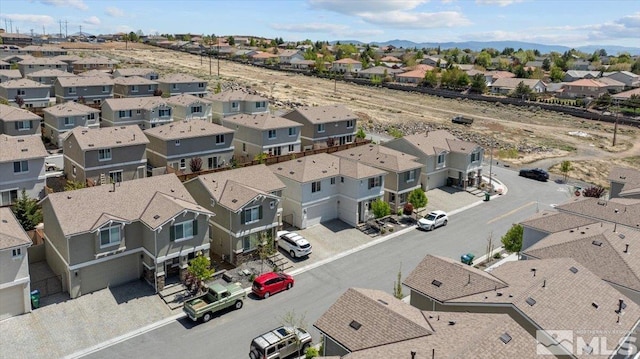 aerial view with a mountain view and a residential view